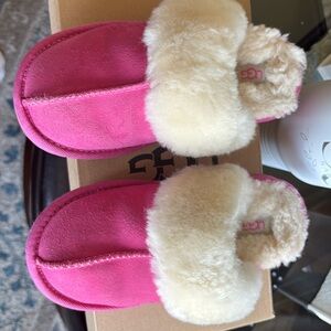 Ugg slip on shoes girls 13 -worn 2/3 times.    Box & packaging intact.